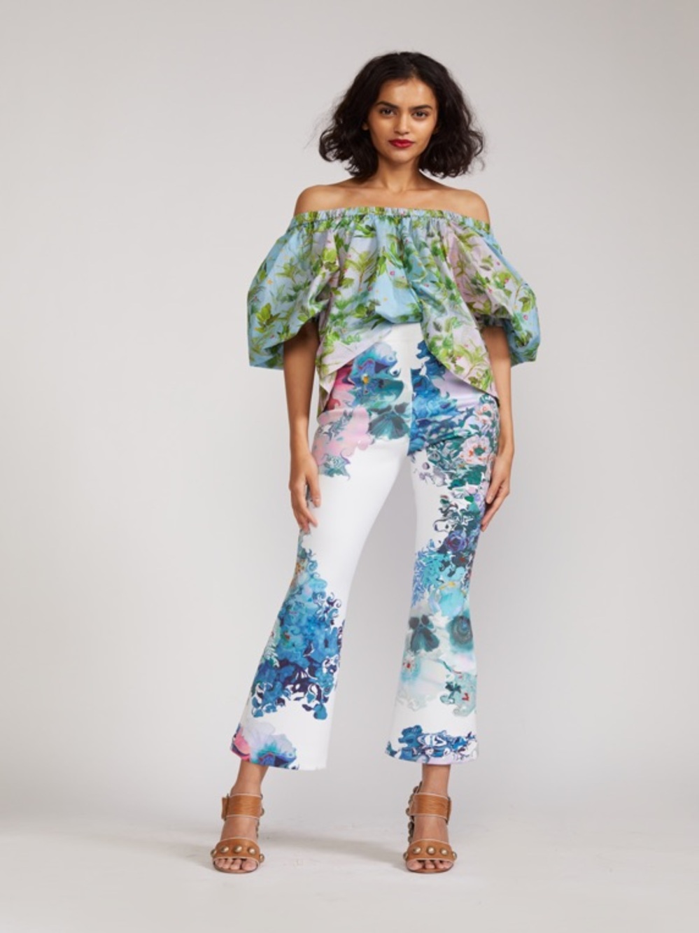 Cynthia Rowley Hourglass Floral Bonded Pants in white flora vibrant flare design